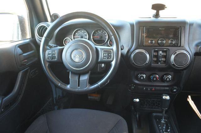 used 2014 Jeep Wrangler Unlimited car, priced at $14,495