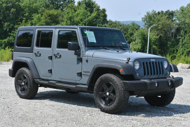 used 2014 Jeep Wrangler Unlimited car, priced at $15,495