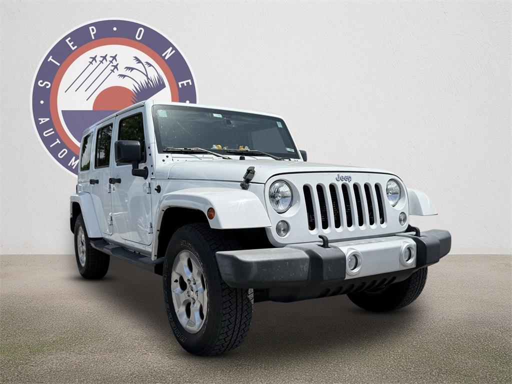 used 2015 Jeep Wrangler Unlimited car, priced at $23,321