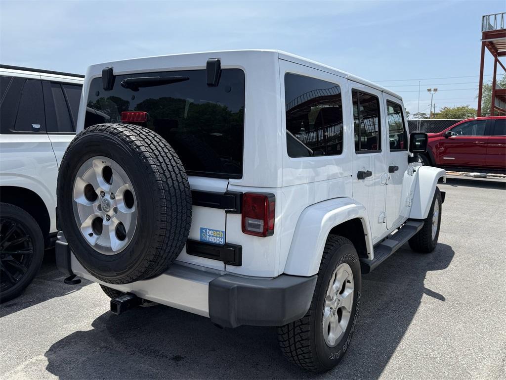 used 2015 Jeep Wrangler Unlimited car, priced at $23,321