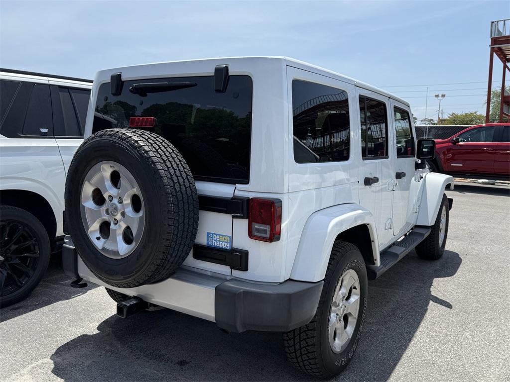 used 2015 Jeep Wrangler Unlimited car, priced at $23,321