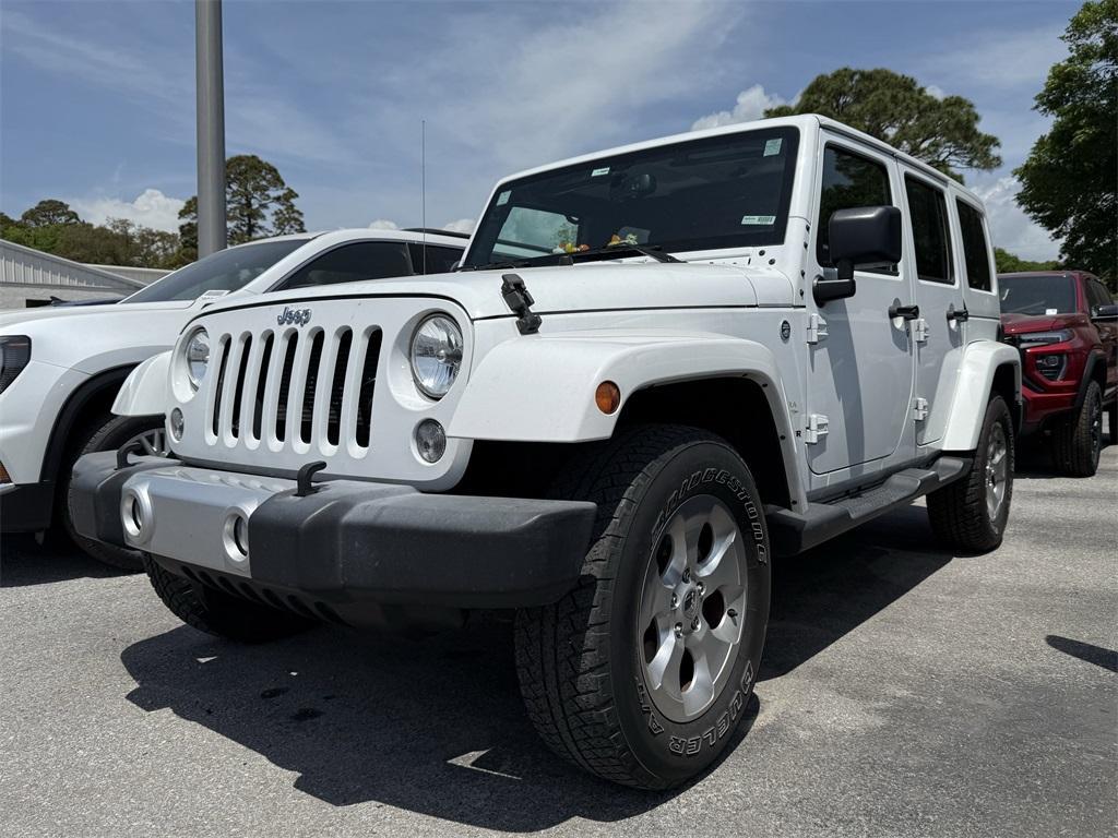 used 2015 Jeep Wrangler Unlimited car, priced at $23,321