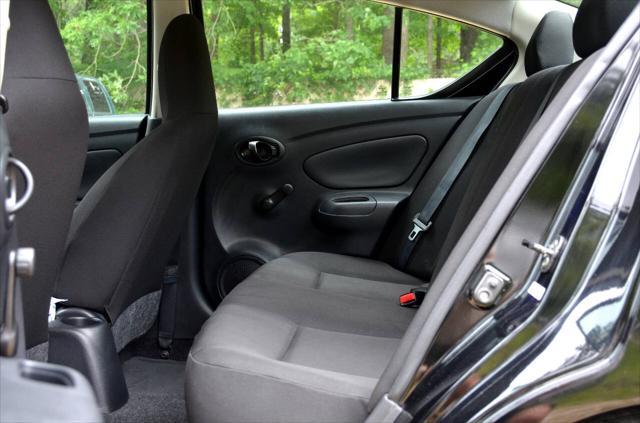 used 2015 Nissan Versa car, priced at $5,900