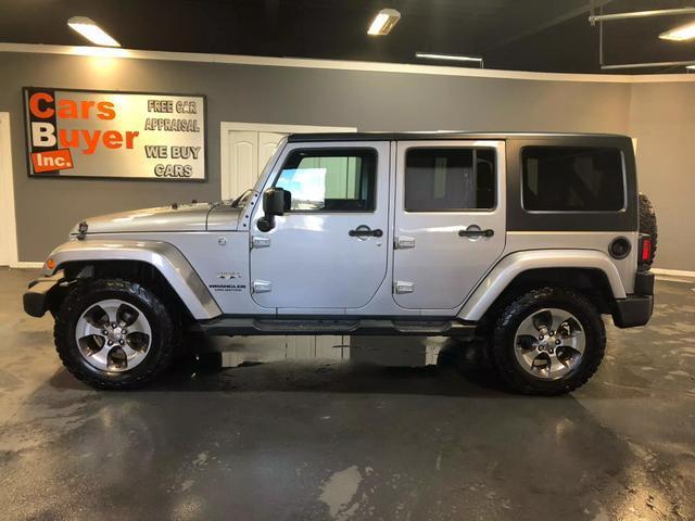 used 2016 Jeep Wrangler Unlimited car, priced at $16,777