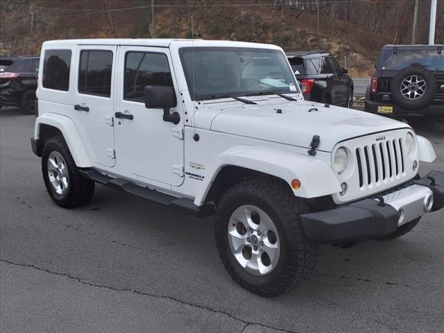 used 2014 Jeep Wrangler Unlimited car, priced at $16,348