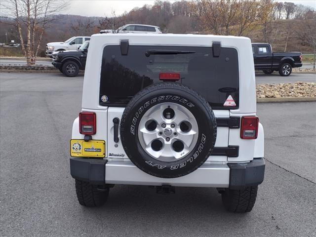 used 2014 Jeep Wrangler Unlimited car, priced at $16,348