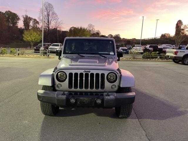 used 2015 Jeep Wrangler Unlimited car, priced at $15,998