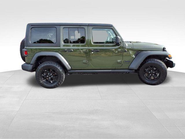 used 2021 Jeep Wrangler Unlimited car, priced at $33,538