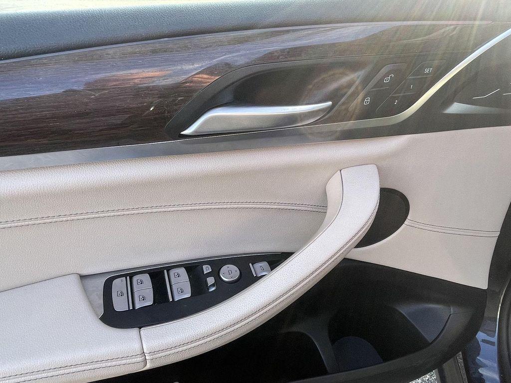 used 2022 BMW X4 car, priced at $32,900