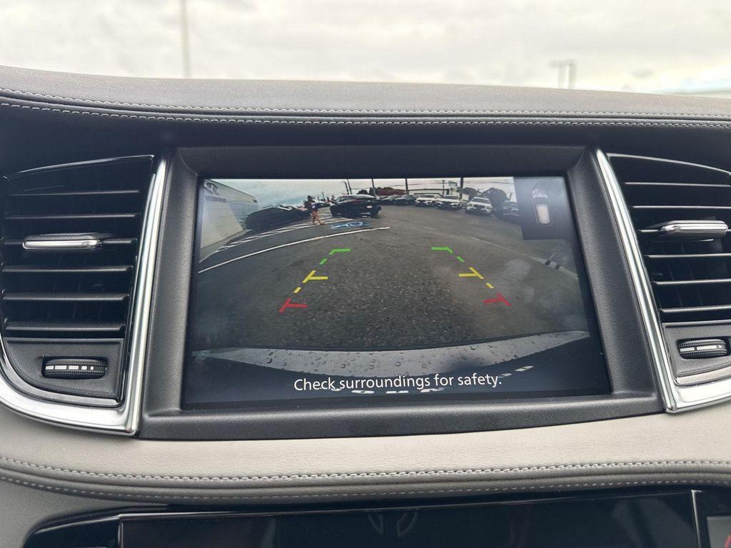 used 2025 INFINITI QX50 car, priced at $37,990