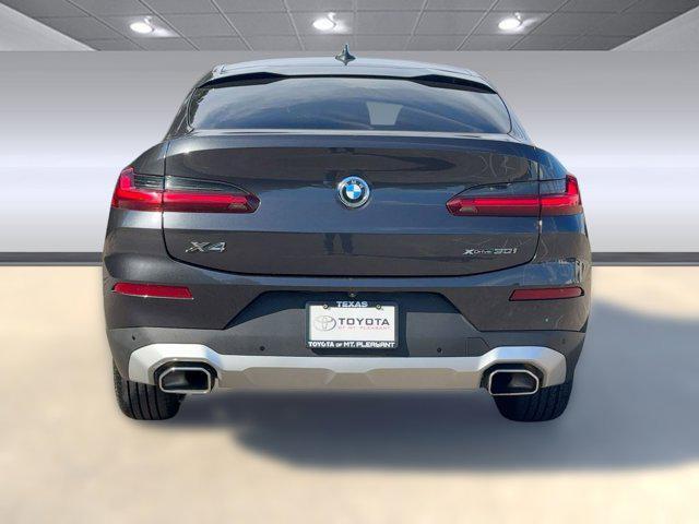 used 2023 BMW X4 car, priced at $37,676