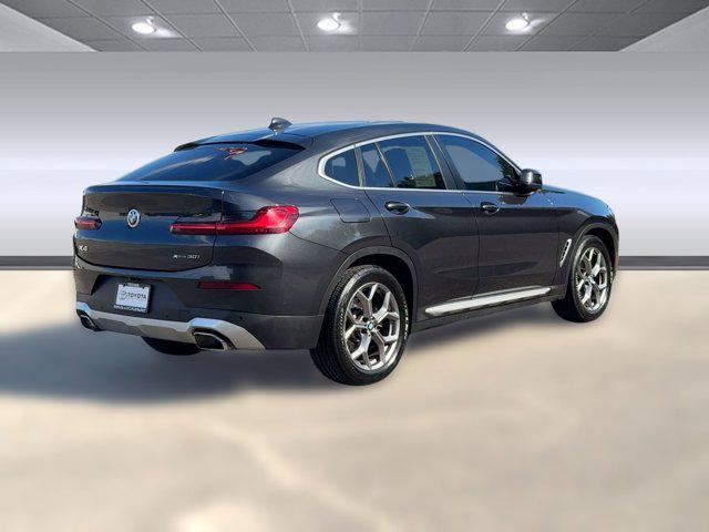 used 2023 BMW X4 car, priced at $37,676