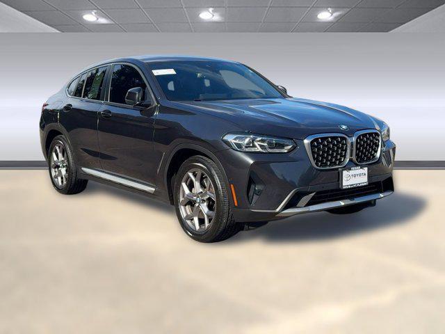 used 2023 BMW X4 car, priced at $37,676