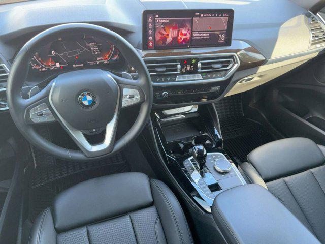 used 2023 BMW X4 car, priced at $37,676