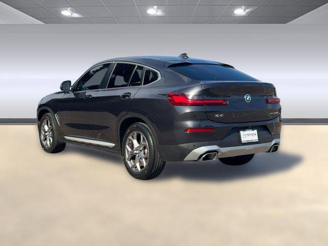 used 2023 BMW X4 car, priced at $37,676