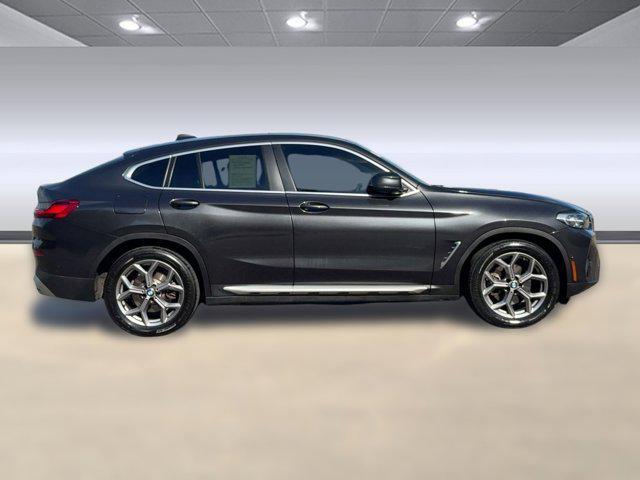 used 2023 BMW X4 car, priced at $37,676