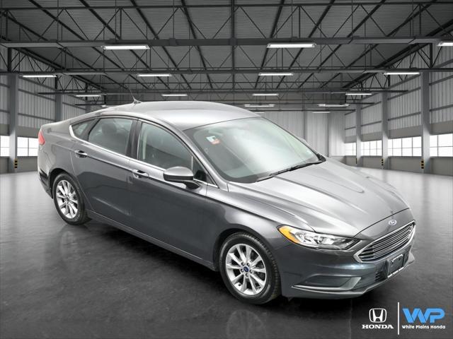 used 2017 Ford Fusion car, priced at $12,500