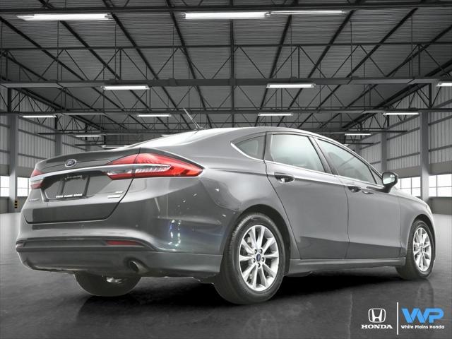 used 2017 Ford Fusion car, priced at $12,500