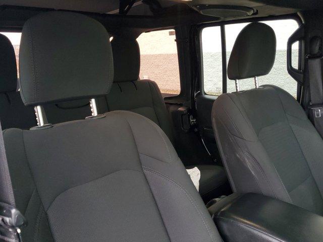 used 2021 Jeep Wrangler Unlimited car, priced at $26,864