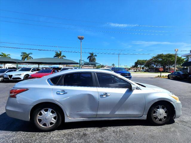 used 2015 Nissan Altima car, priced at $2,999