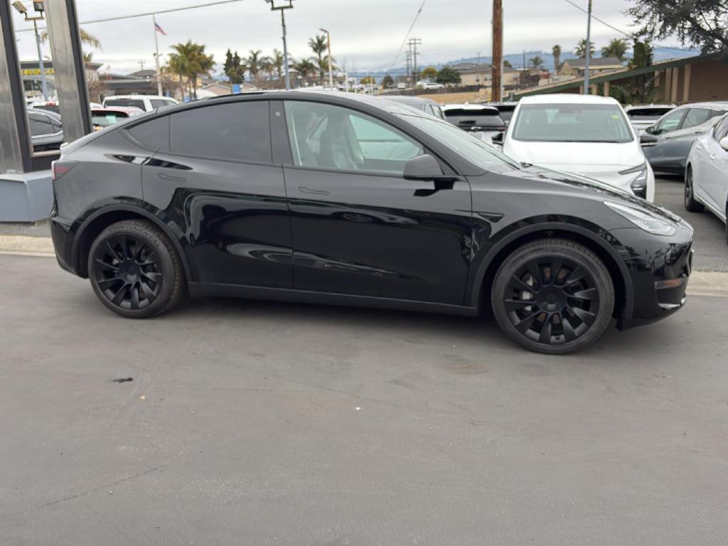 used 2022 Tesla Model Y car, priced at $28,690