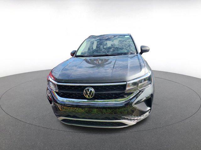used 2024 Volkswagen Taos car, priced at $18,227