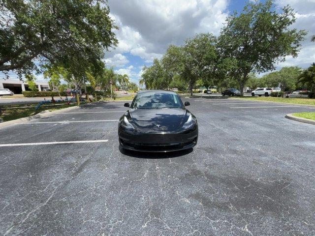 used 2022 Tesla Model 3 car, priced at $27,643