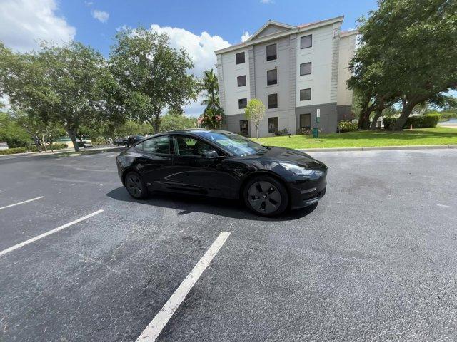 used 2022 Tesla Model 3 car, priced at $27,643