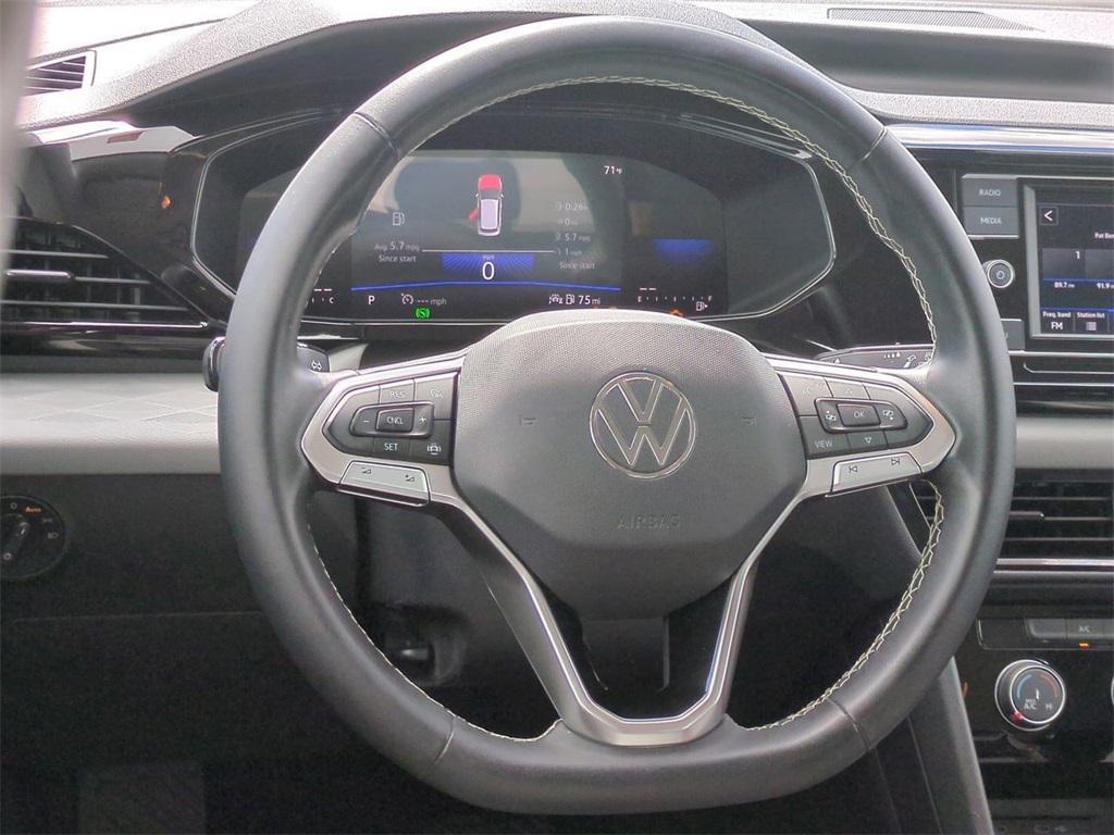 used 2023 Volkswagen Taos car, priced at $18,500