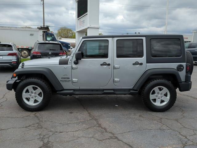 used 2014 Jeep Wrangler Unlimited car, priced at $17,575