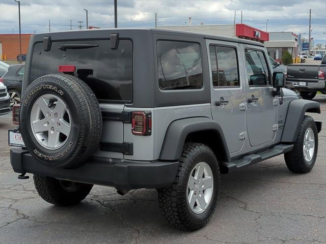 used 2014 Jeep Wrangler Unlimited car, priced at $17,575