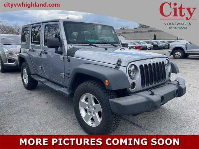 used 2014 Jeep Wrangler Unlimited car, priced at $18,985