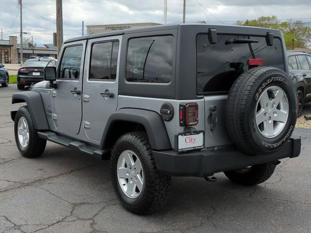 used 2014 Jeep Wrangler Unlimited car, priced at $16,945