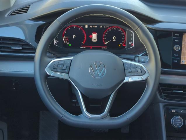 used 2023 Volkswagen Taos car, priced at $25,686