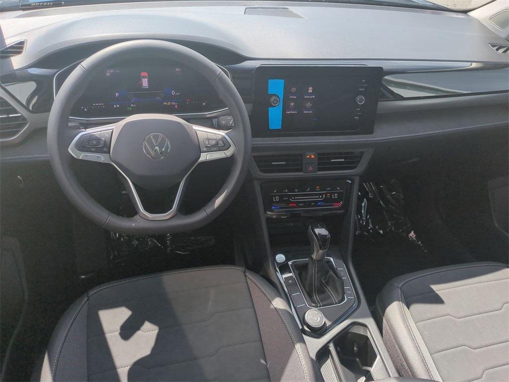 new 2025 Volkswagen Taos car, priced at $33,099
