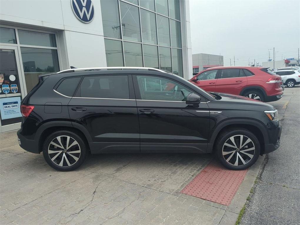 used 2023 Volkswagen Taos car, priced at $20,000