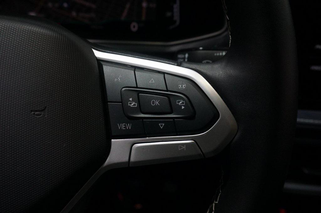 used 2025 Volkswagen Taos car, priced at $29,400