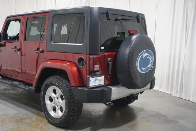 used 2013 Jeep Wrangler Unlimited car, priced at $16,990