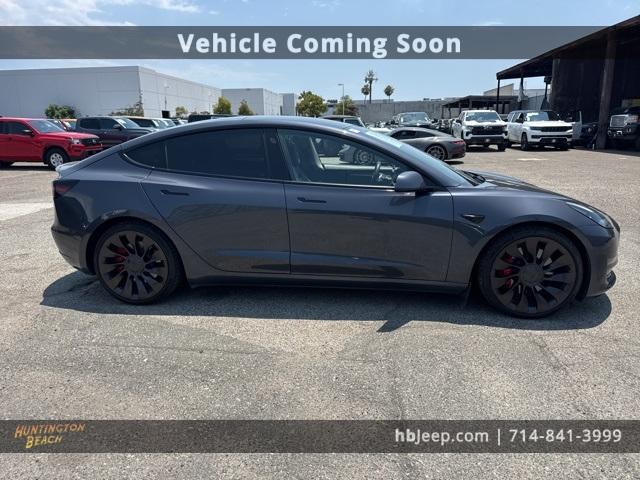used 2022 Tesla Model 3 car, priced at $25,700