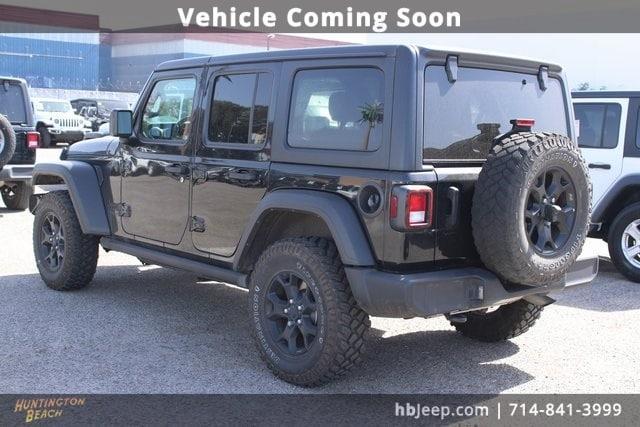 used 2021 Jeep Wrangler Unlimited car, priced at $30,200