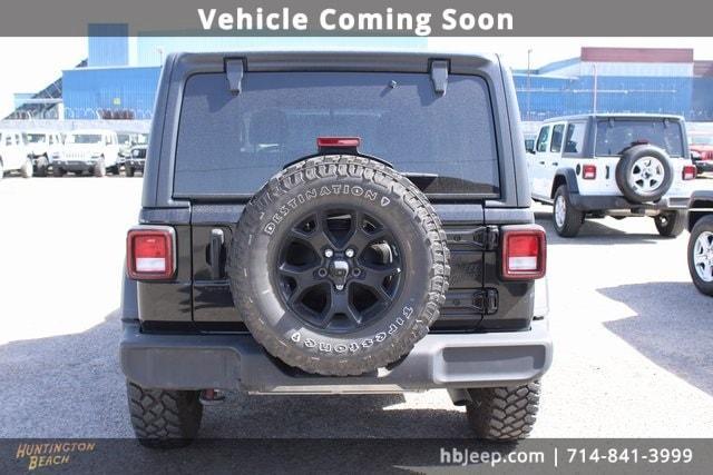 used 2021 Jeep Wrangler Unlimited car, priced at $30,200