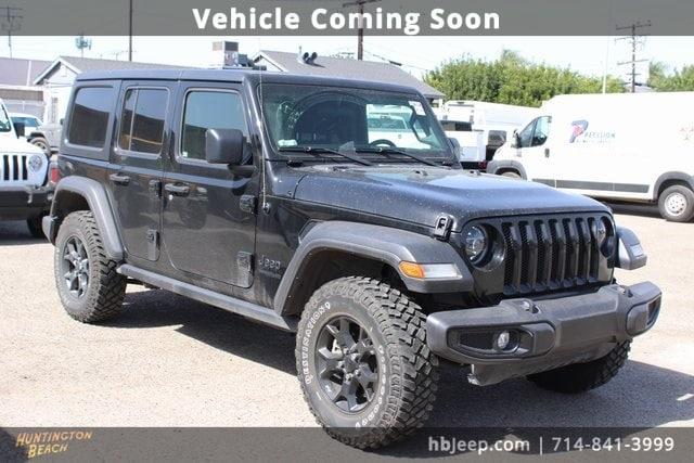 used 2021 Jeep Wrangler Unlimited car, priced at $30,200