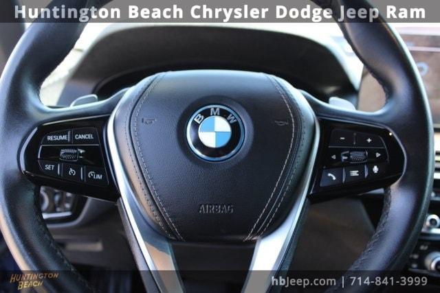used 2023 BMW 530e car, priced at $30,454