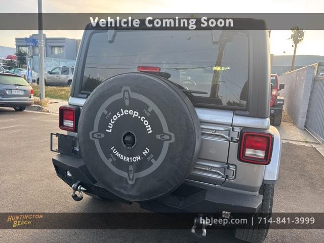 used 2021 Jeep Wrangler Unlimited car, priced at $27,200