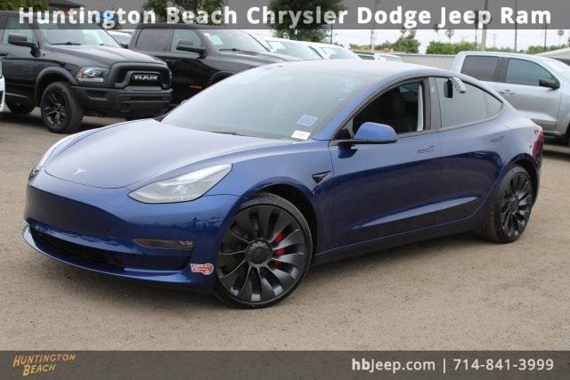 used 2023 Tesla Model 3 car, priced at $29,700