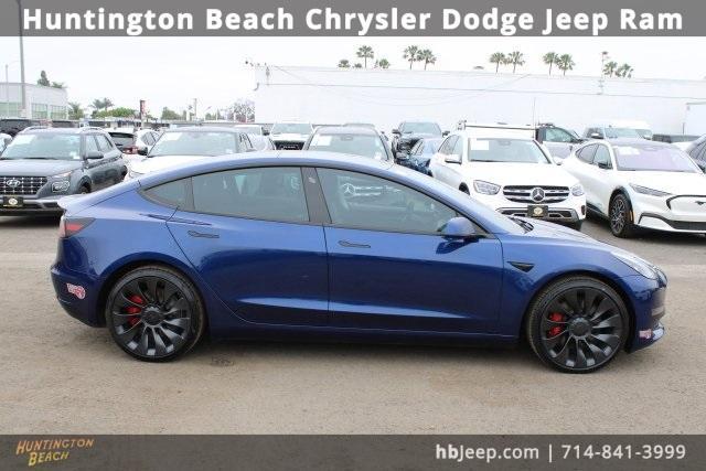 used 2023 Tesla Model 3 car, priced at $29,700