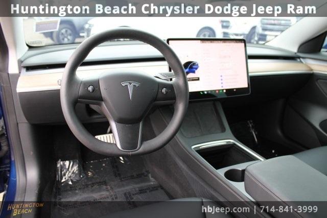 used 2023 Tesla Model 3 car, priced at $29,700