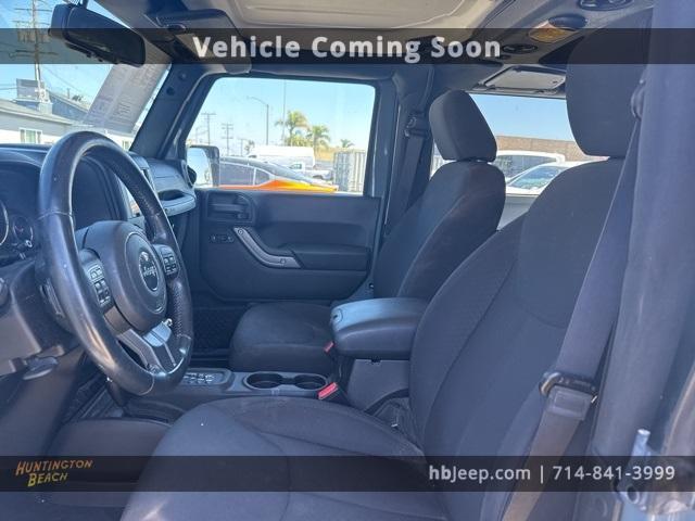 used 2015 Jeep Wrangler car, priced at $17,990