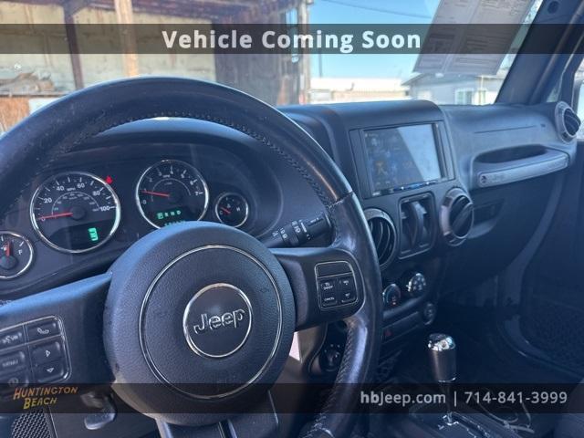 used 2015 Jeep Wrangler car, priced at $17,990