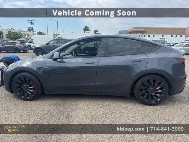 used 2023 Tesla Model Y car, priced at $32,990
